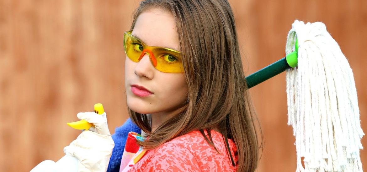 Lady with cleaning supplies